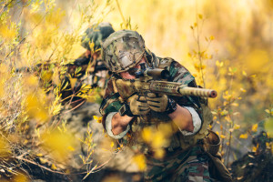 Airsoft sniper and spotter in the field